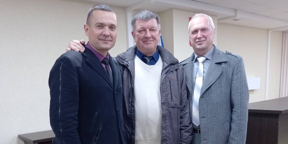 From left to right: Artur Netreba, Aleksandr Kostrov, Viktor Bachurin in court